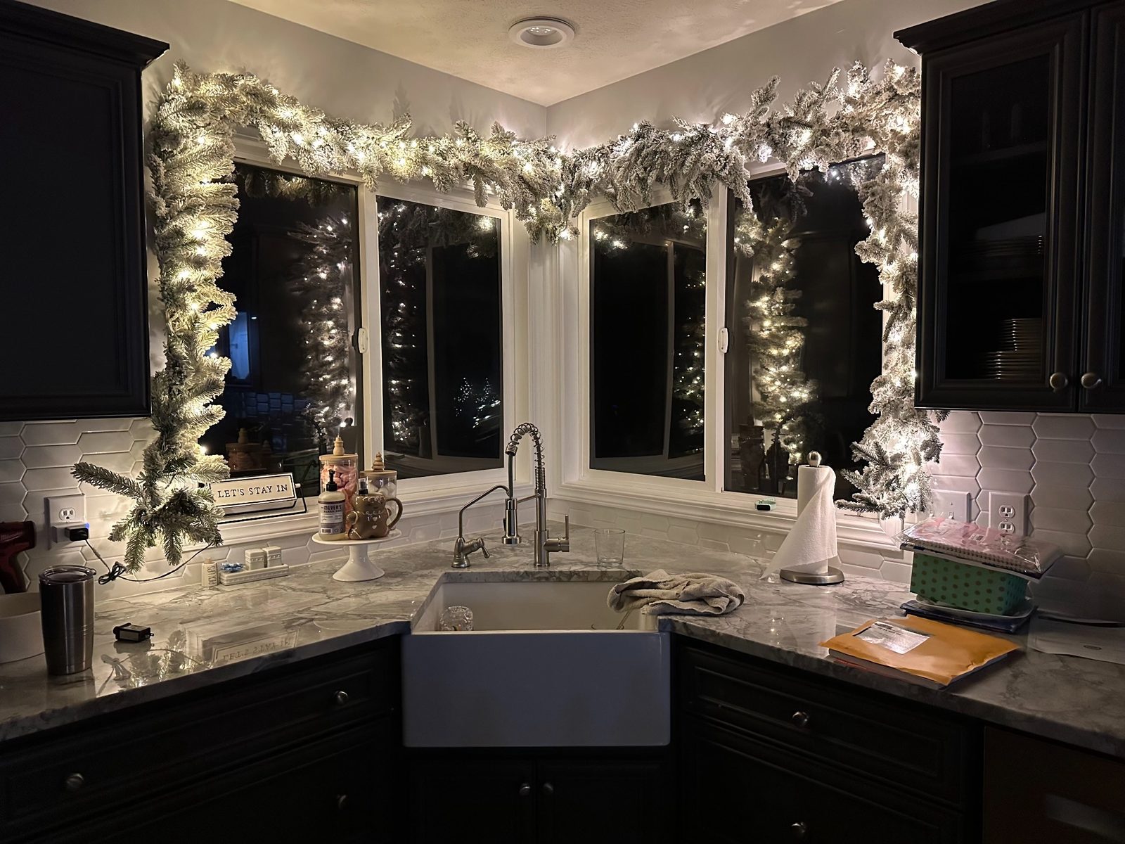 Additional after kitchen photo in Grand Rapids with lit sink area and backsplash